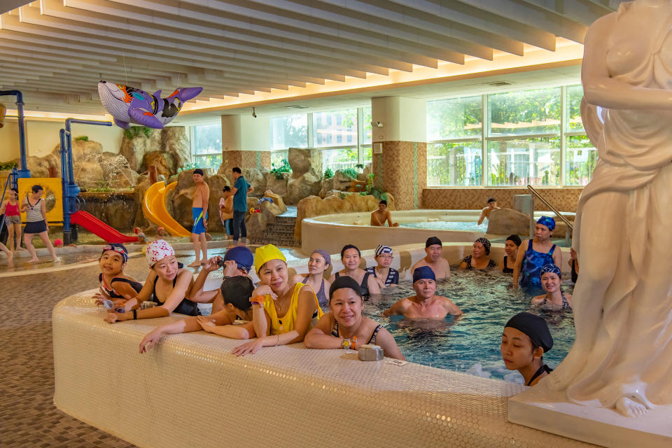 Supporters at a swimming pool wait for the President's arrival during a visit on Oct. 5. | Billy H.C. Kwok for TIME