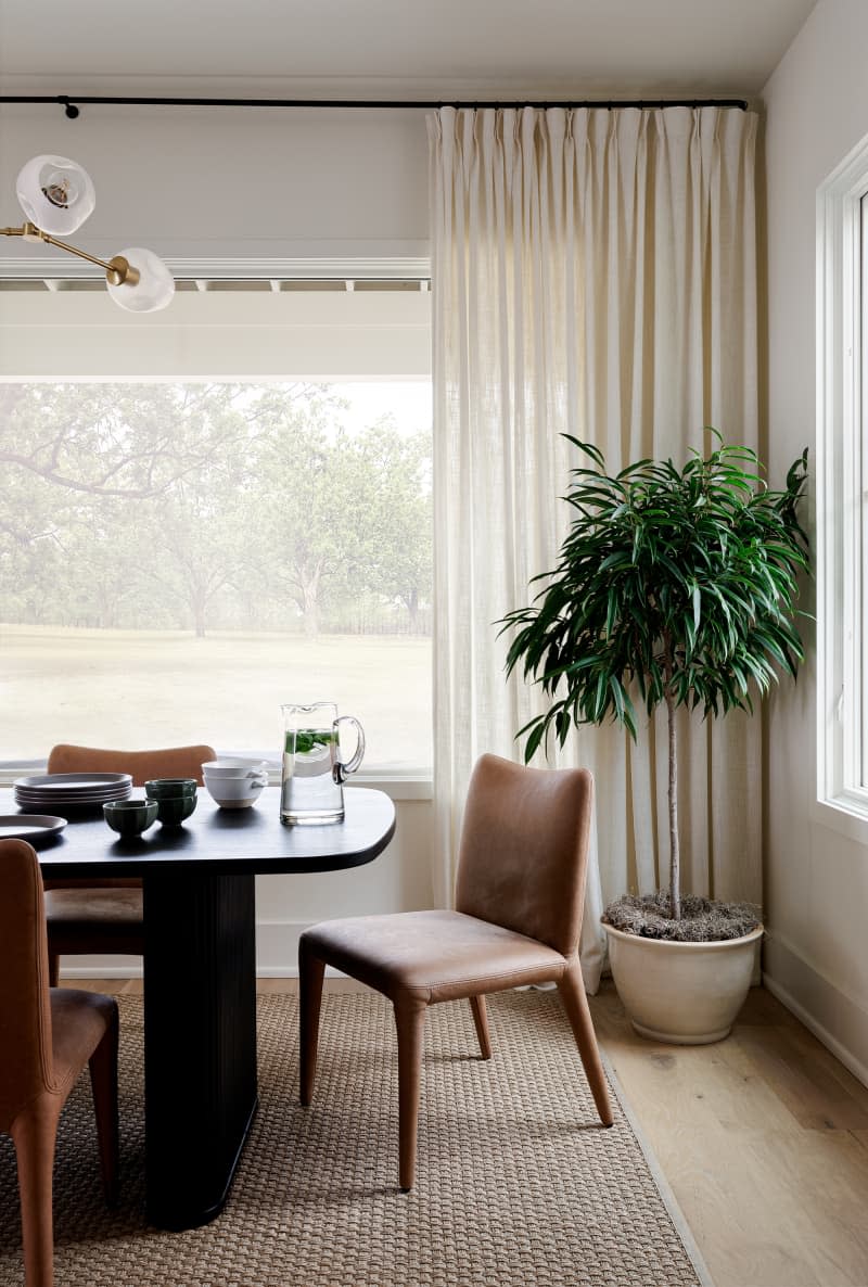 Monochromatic dining room with pale neutrals and browns