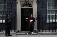 British Labour MP Emma Dent Coad delivers a petition against UK involvement in any military escalation in Syria, at Downing Street in London, Britain April 13, 2018. REUTERS/Simon Dawson