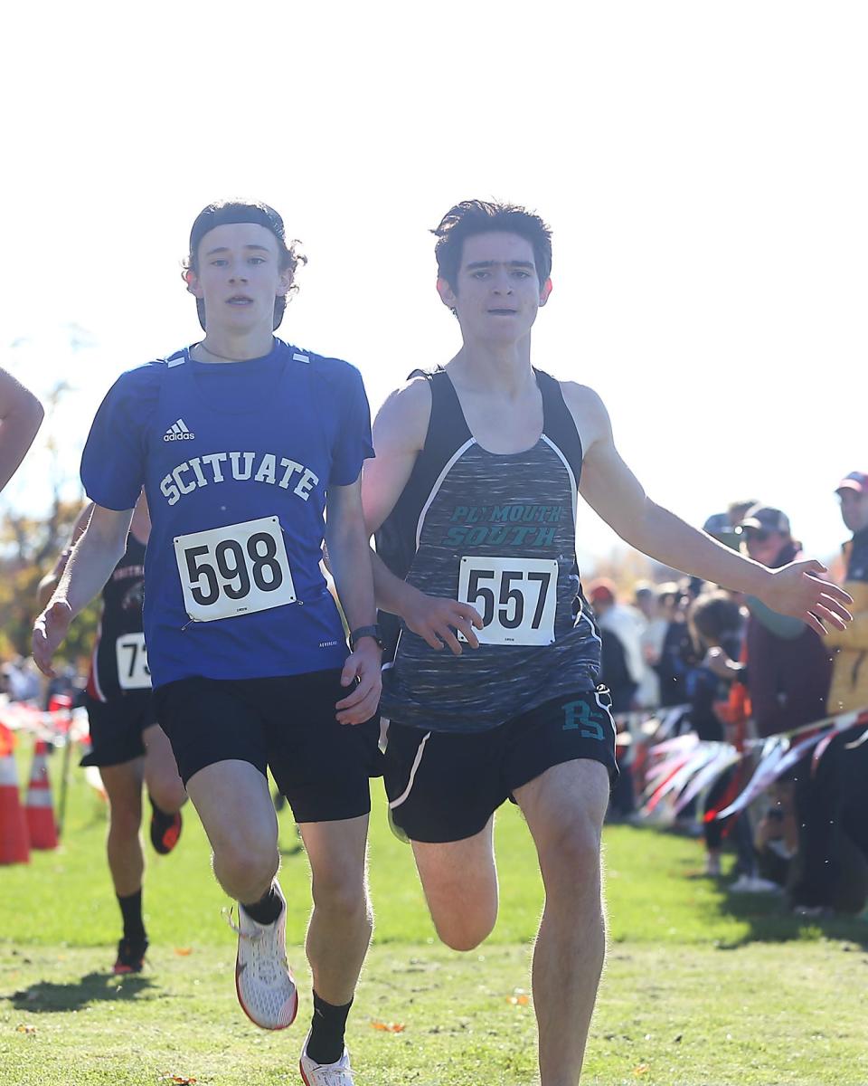 Plymouth South's Christian Amaral, right, runs for the finish line during the Patriot League Championship meet at Hingham High on Saturday, Oct. 29, 2022.