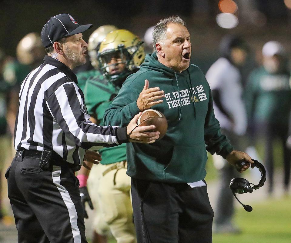 St. Vincent-St. Mary head coach Terry Ciscone questions a third-quarter fumble call against Hoban on Friday, Oct. 7, 2022.