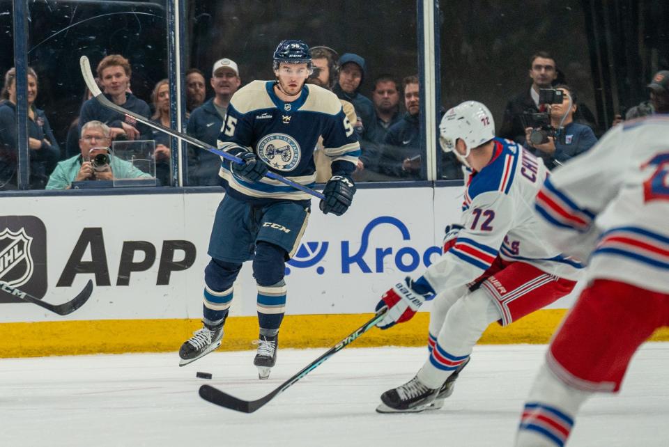 Oct 14, 2023; Columbus, Ohio, United States;
Columbus Blue Jackets defenseman David Jiricek (55) skates towards the puck against New York Rangers center Filip Chytil (72) during the second period of their game on Saturday, Oct. 14, 2023 at Nationwide Arena.