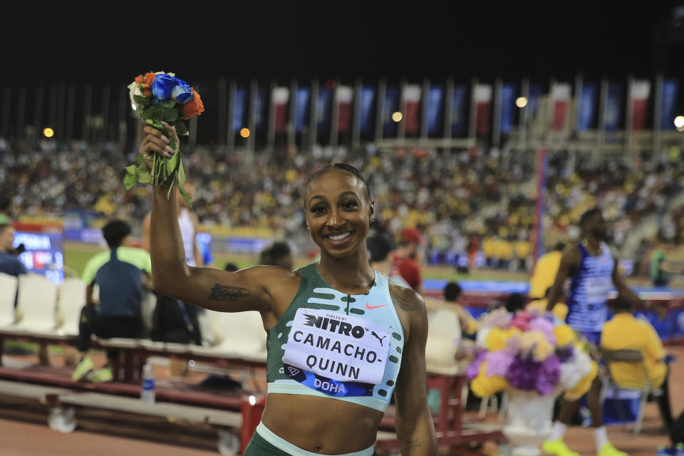 Jasmine Camacho-Quinn of Puerto Rico reacts after winning the 100 meters hurdles during a Diamond League track meet in Doha, Qatar, Friday, May 5, 2023. (AP Photo/Hussein Sayed)