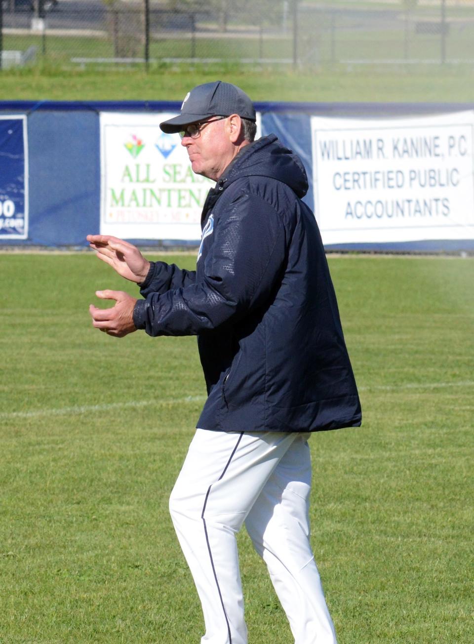 Petoskey's Mike Loper is the same optimistic and approachable coach on the baseball field as he is on the football field.