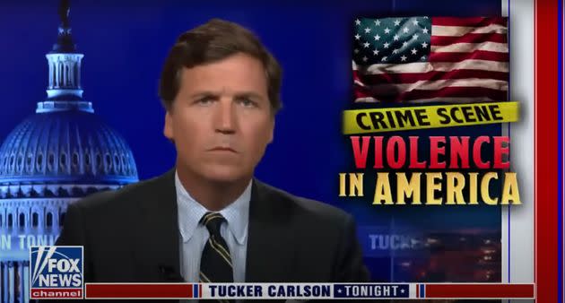 A clip shared Wednesday compared Fox News host Tucker Carlson's coverage of acts of mass violence. (Photo: Fox News)