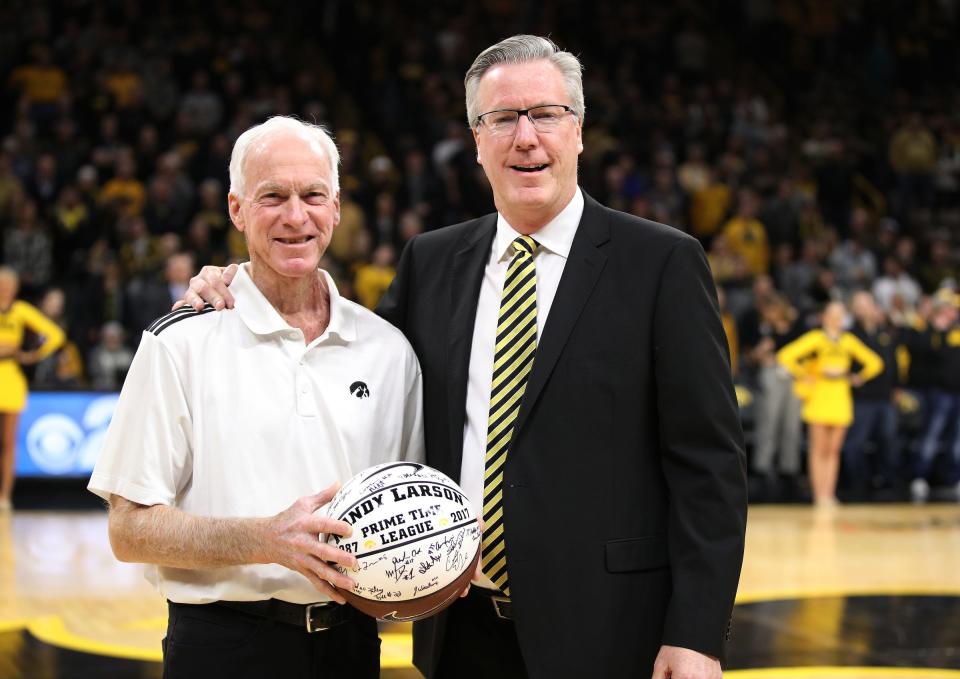 Iowa Hawkeyes head coach Fran McCaffery presents Randy Larson a ceremonial ball for his years of service running the PrimeTime League before their game against the Ohio State Buckeyes Saturday, January 12, 2019 at Carver-Hawkeye Arena. (Brian Ray/hawkeyesports.com)