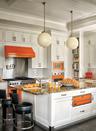 <p>In the <a href="https://www.elledecor.com/design-decorate/house-interiors/a28859701/hearst-estate-new-york-hudson-valley/" rel="nofollow noopener" target="_blank" data-ylk="slk:Hearst family's estate;elm:context_link;itc:0;sec:content-canvas" class="link ">Hearst family's estate</a>, the kitchen's white backsplash complements the <a href="https://www.vikingrange.com/consumer/index.jsp" rel="nofollow noopener" target="_blank" data-ylk="slk:Viking;elm:context_link;itc:0;sec:content-canvas" class="link ">Viking</a> appliances in custom Hermès orange.</p>