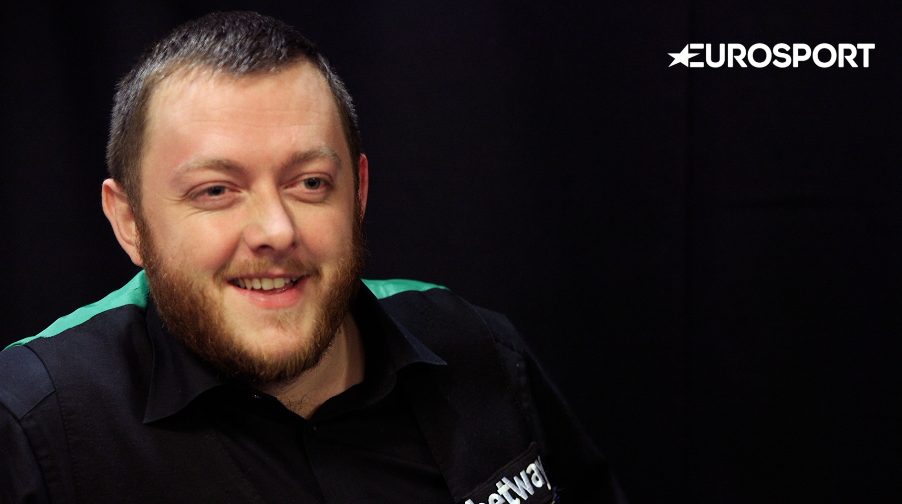 Last year's beaten finalist Mark Allen hard to fend off a strong challenge from Jak Jones to seal a place in the third round.