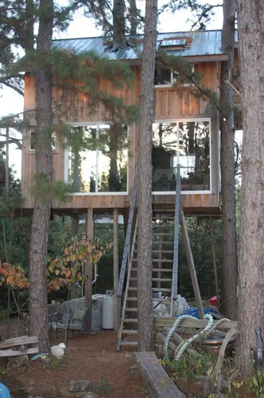 <p>Stay in this <span class="redactor-unlink">Missouri cabin</span> nestled amongst five pine trees, and you might have a chance to attend one of the hosts' drum circles or potlucks. It's serious inspiration for that tiny house you've been dreaming of building.</p><p><a class="link " href="https://www.airbnb.com/rooms/3793576" rel="nofollow noopener" target="_blank" data-ylk="slk:BOOK NOW;elm:context_link;itc:0;sec:content-canvas">BOOK NOW</a> <strong><em>Two-Story Treehouse</em></strong><br></p>