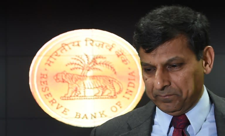<p>India’s central bank – Reserve Bank of India (RBI) governor Raghuram Rajan walks after addressing a press conference following a monetary policy review meeting in Mumbai on June 7, 2016. </p>