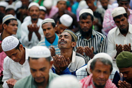 A Rohingya refugee man cries as he take part in Eid al-Adha prayer near the Kutupalang makeshift refugee camp, in Cox’s Bazar, Bangladesh, September 2, 2017. REUTERS/Mohammad Ponir Hossain