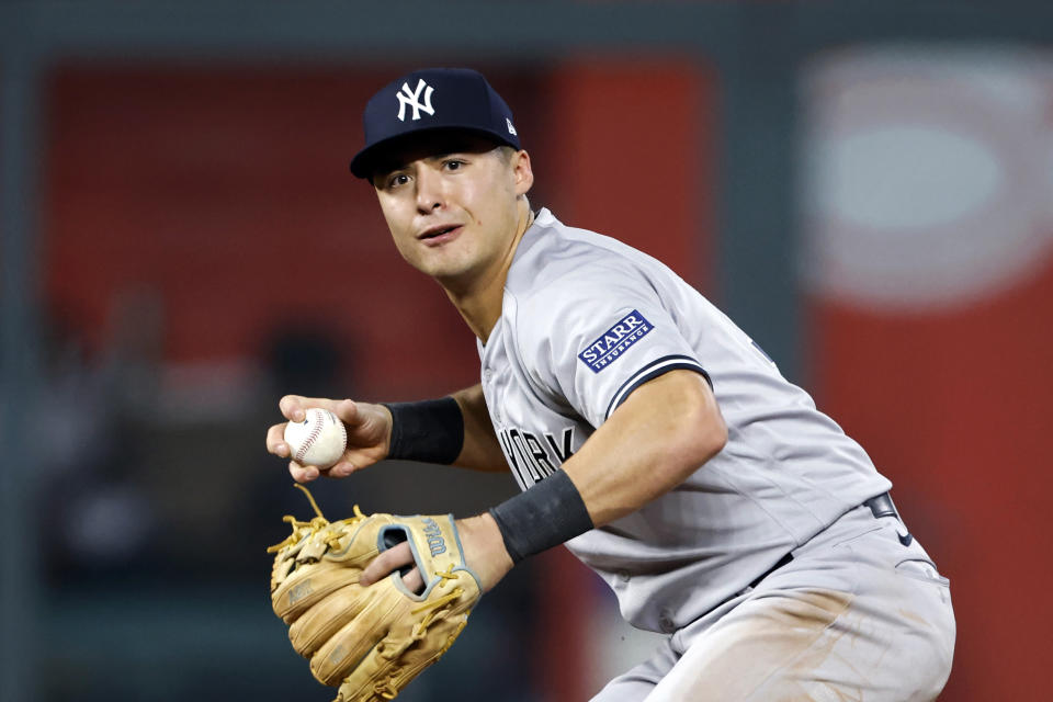 FILE - New York Yankees shortstop Anthony Volpe throws to first base for an out during the ninth inning of a baseball game against the Kansas City Royals in Kansas City, Mo., Saturday, Sept. 30, 2023. Volpe won a Gold Gloves, in news announced Sunday, Nov. 5, by Rawlings. (AP Photo/Colin E. Braley, File)