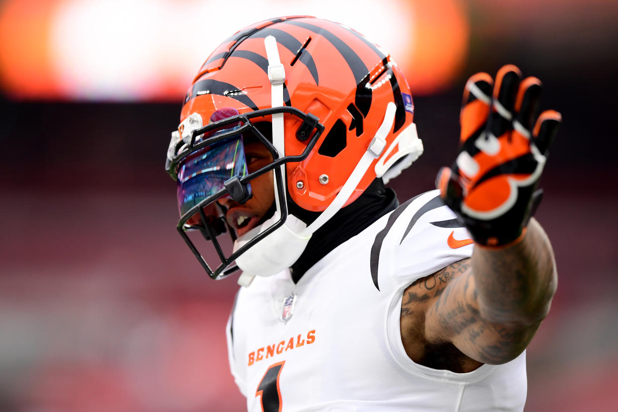 CLEVELAND, OHIO - JANUARY 09: Ja'Marr Chase #1 of the Cincinnati Bengals warms up before a game between the Cincinnati Bengals and Cleveland Browns at FirstEnergy Stadium on January 09, 2022 in Cleveland, Ohio. (Photo by Emilee Chinn/Getty Images)