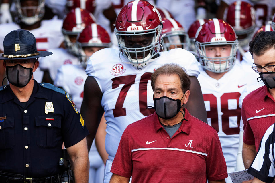 Alabama coach Nick Saban leads his team to the field before an NCAA college football game against Missouri in Columbia, Mo., on Sept. 26, 2020. Saban and athletic director Greg Byrne tested positive for COVID-19, days before the Southeastern Conference's biggest regular-season showdown.<span class="copyright">L.G. Patterson—AP</span>