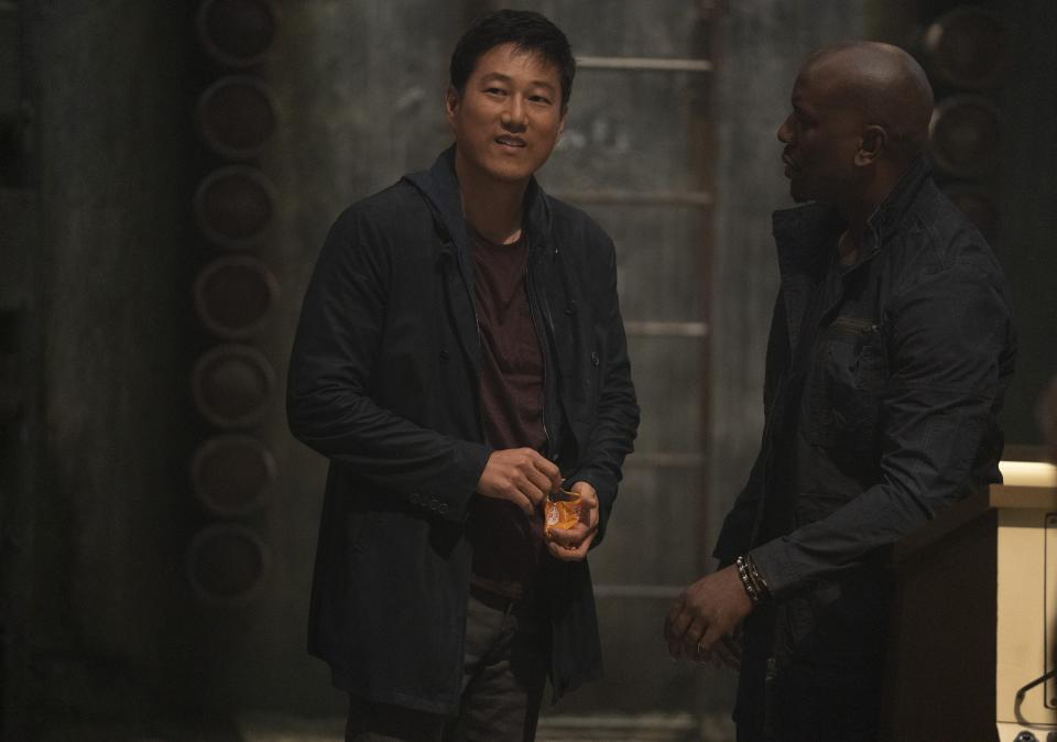 Han (Sung Kang) and Roman (Tyrese Gibson) in Fast & Furious 9 (Universal/PA)