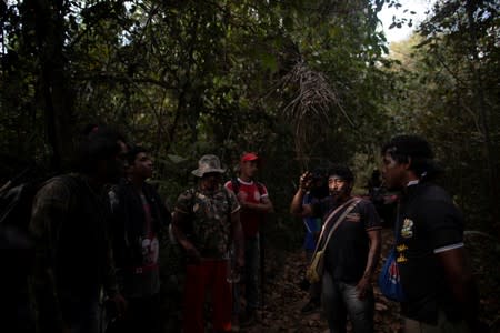 The Wider Image: Fighting fire with fire, Amazon 'forest guardians' stalk loggers