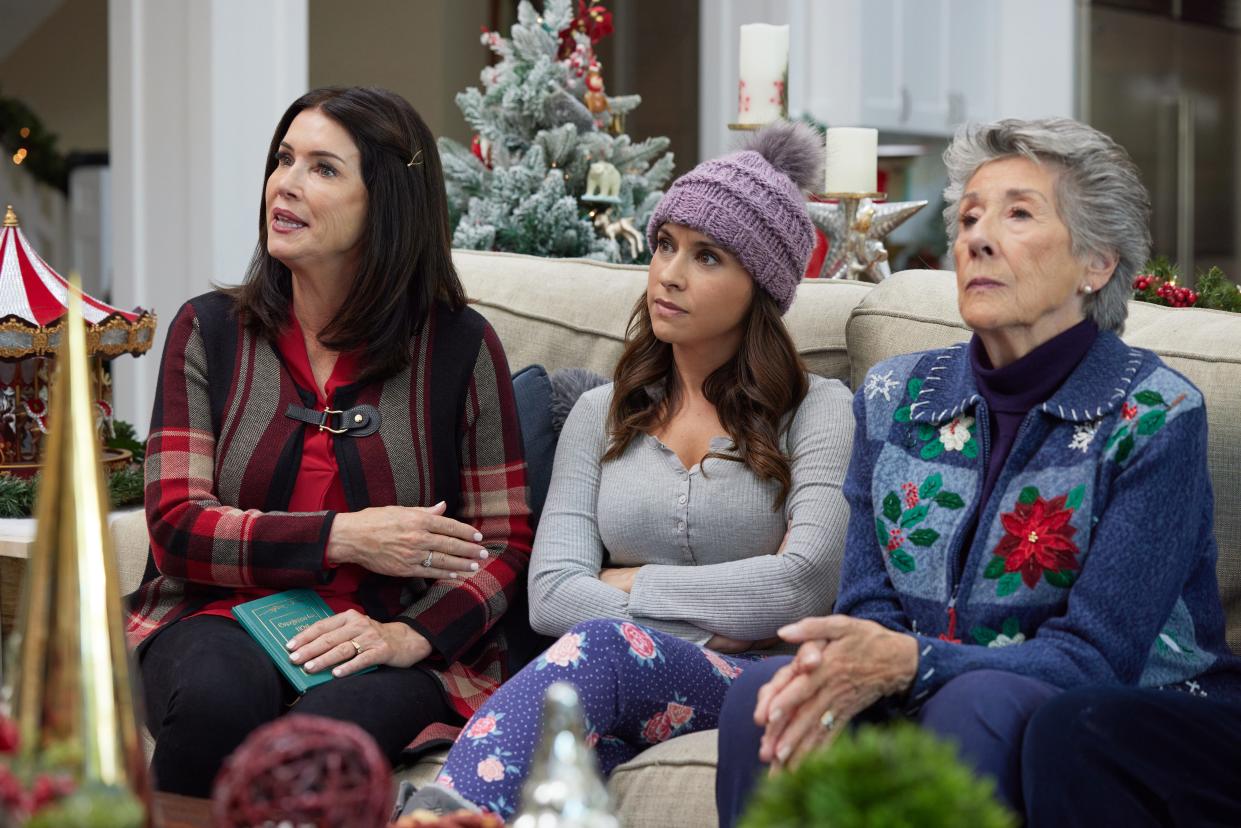 Lacey Chabert, middle, with Laura Wardle and Ellen Travolta in a scene from the Hallmark Channel movie “Haul Out the Holly,” written by Hermitage Artist Retreat Artistic Director and CEO Andy Sandberg.