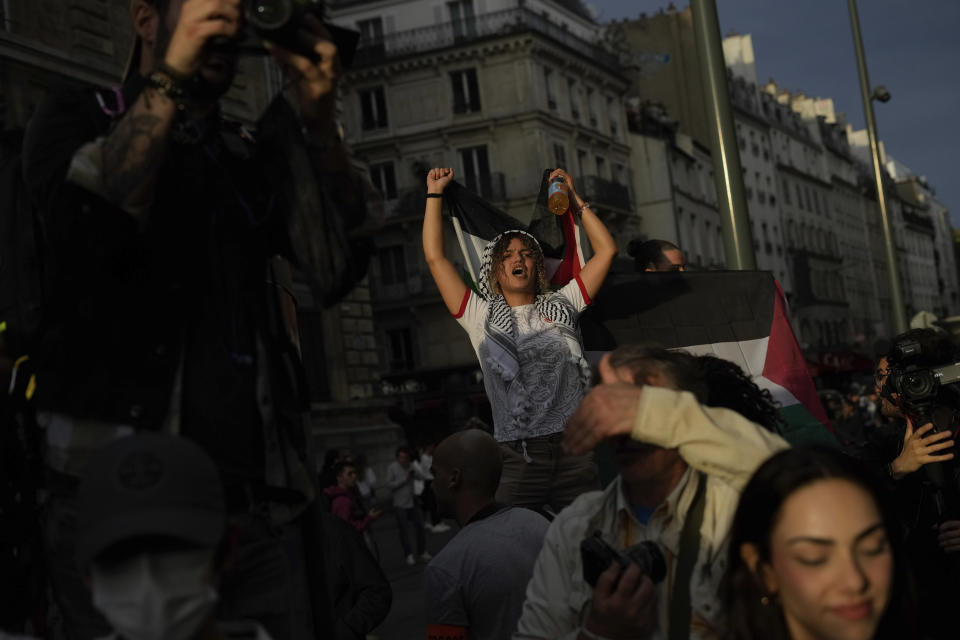 A protestor chants slogans during a rally in solidarity with the Palestinian people in Gaza, in Paris, Thursday, Oct.12, 2023. (AP Photo/Thibault Camus)