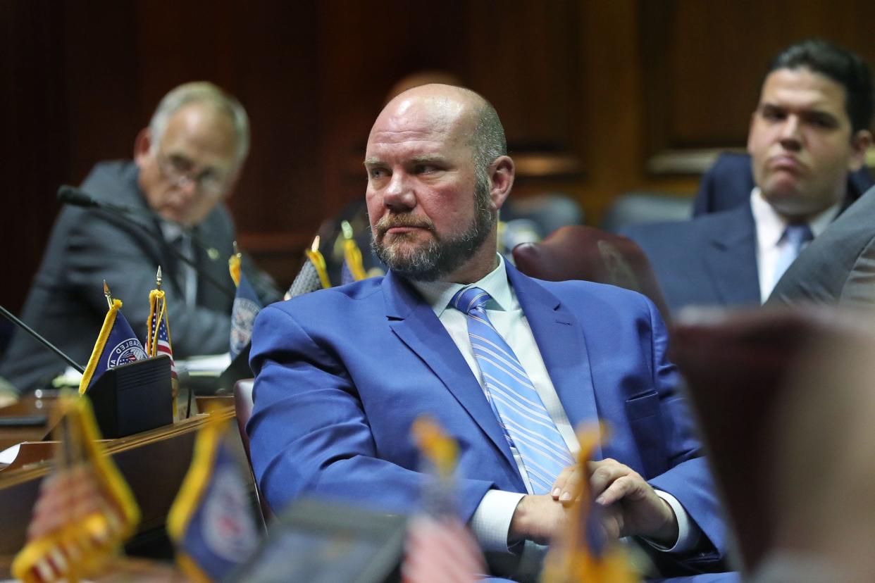 Rep. Alan Morrison listens to speakers during a legislative hearing. Morrison, R-Brazil, is the author of House Bill 1383, a bill that would further strip protections for Indiana's few remaining wetlands. This bill has seen significant opposition but lawmakers are pushing this bill through, according to environmental advocates.