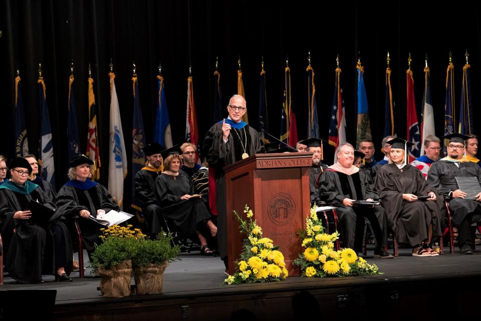 Adrian College President Jeffrey Docking, at the podium, and his staff welcomed 602 new students to the college's campus during this year’s matriculation ceremony Aug. 13 in Dawson Auditorium.