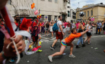 <p>Revelers enjoy the Pride London Parade in London, Saturday, July 8, 2017. (Photo: Frank Augstein/AP) </p>