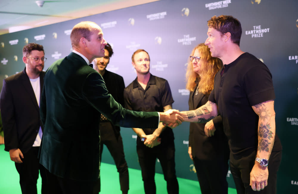 Prince William meets OneRepublic credit:Bang Showbiz