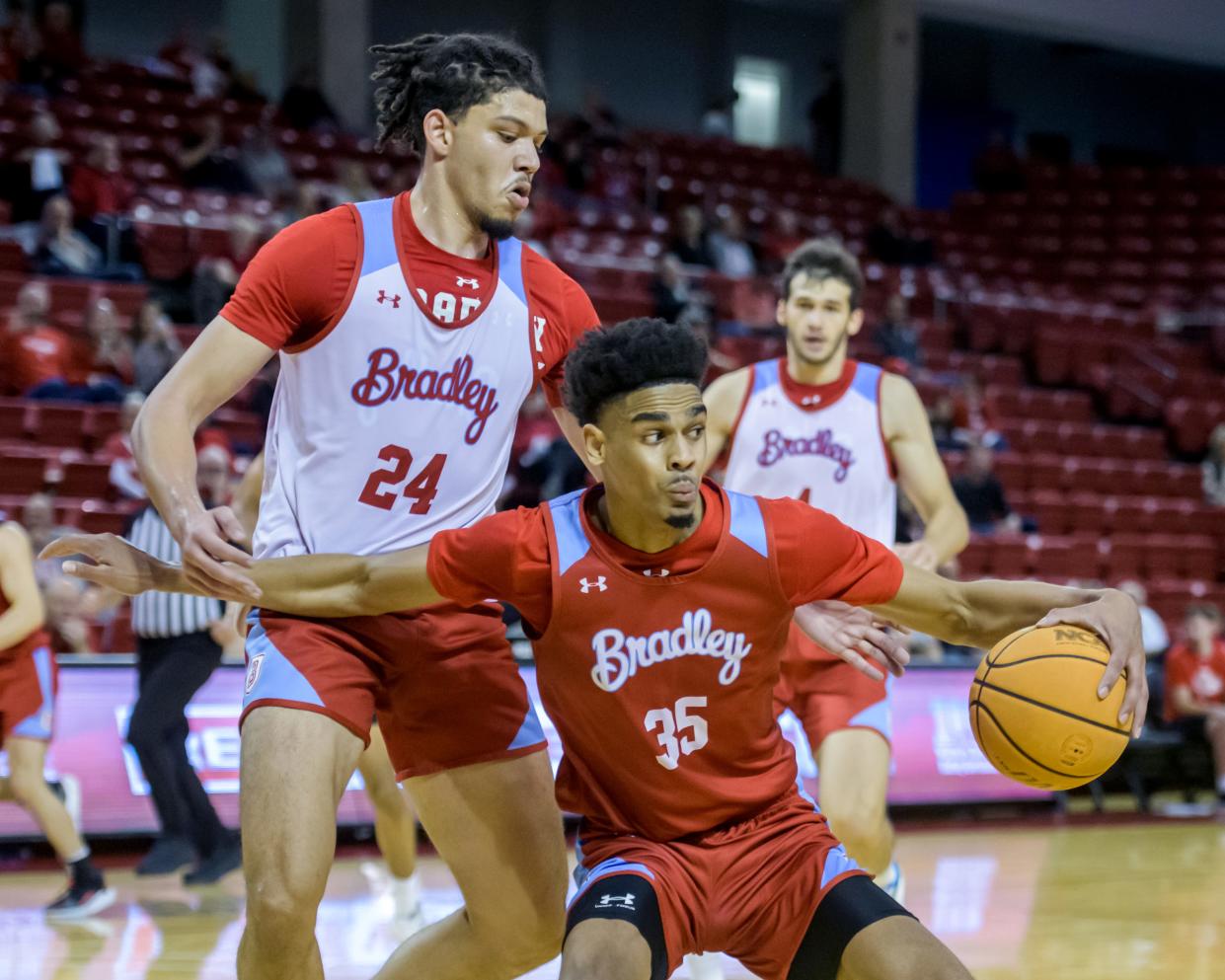 Bradley's Darius Hannah (35) tries to make a move around Kyle Thomas during the Red-White Scrimmage on Saturday, Oct. 21, 2023 at Renaissance Coliseum.