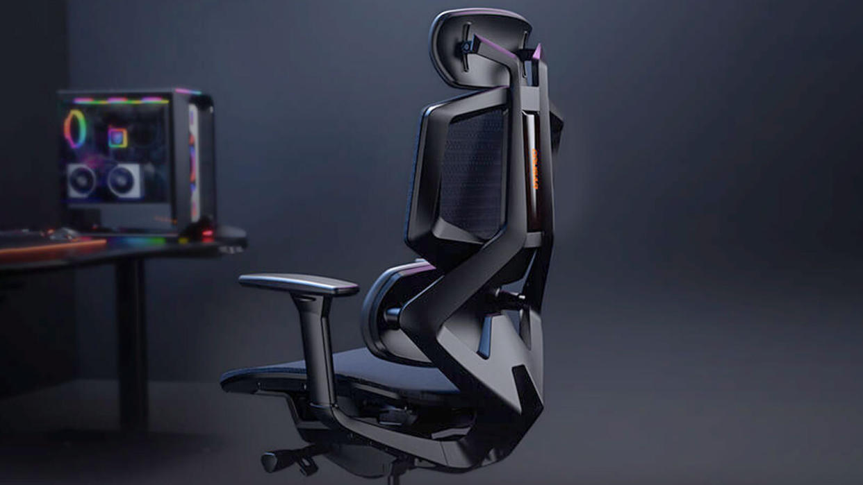  The Cougar Argo One gaming chair next to a desk. 