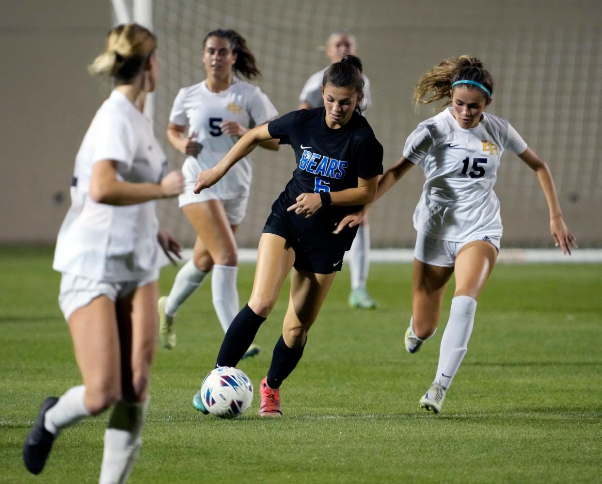 Bartram Trail's Olivia Bori (6) dribbles upfield against Boca Raton in Friday's Class 7A girls soccer championship.