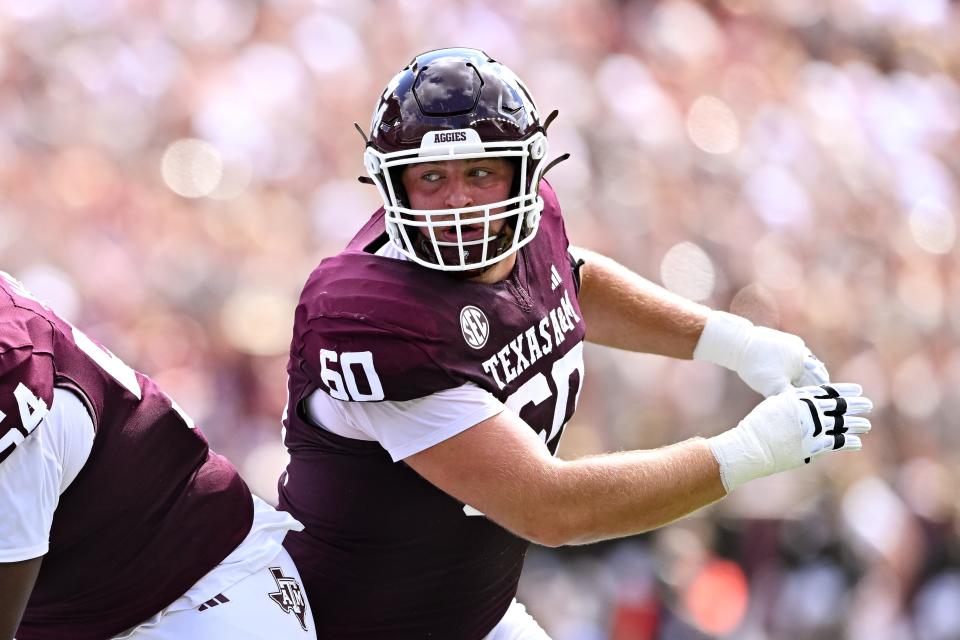 Sep 23, 2023; College Station, Texas, USA; Texas A&M Aggies offensive lineman Trey Zuhn III (60) in action during the first quarter against the Auburn Tigers at Kyle Field.