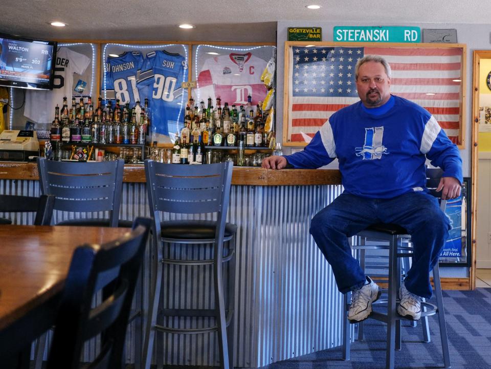 Yooperman's Bar and Grill owner Donnie Stefanski sits inside his family's bar in Goetzville on Saturday, April 28, 2018 in Michigan's Upper Peninsula. Stefanski is in the NFL Fan Hall of Fame and did not miss a single Detroit Lions home game for 25 years despite living in the Upper Peninsula and driving 365 miles to and from Ford Field in Detroit.