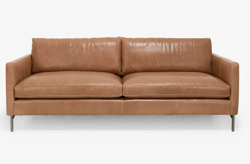 <p>We're dying to sink into this structured (yet super comfy looking) leather sofa.</p> <p>$2,636 (originally $3,295) | <a rel="nofollow noopener" href="http://click.linksynergy.com/fs-bin/click?id=93xLBvPhAeE&subid=0&offerid=472601.1&type=10&tmpid=23216&RD_PARM1=http%3A%2F%2Fwww.abchome.com%2Fshop%2Fcobble-hill-nolita-leather-sofa-1498107-config&u1=Instyle" target="_blank" data-ylk="slk:ABC Carpet & Home;elm:context_link;itc:0;sec:content-canvas" class="link ">ABC Carpet & Home</a></p>
