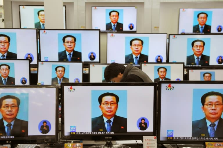 TV monitors at a Seoul electronics shop display the news of Jang Song-Thaek's excution, in December 2013