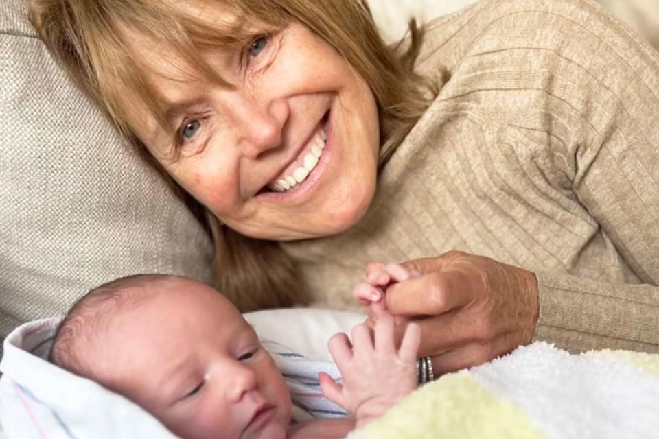 <p>Katie Couric/Instagram</p> Katie Couric with her newborn grandson John on Easter.