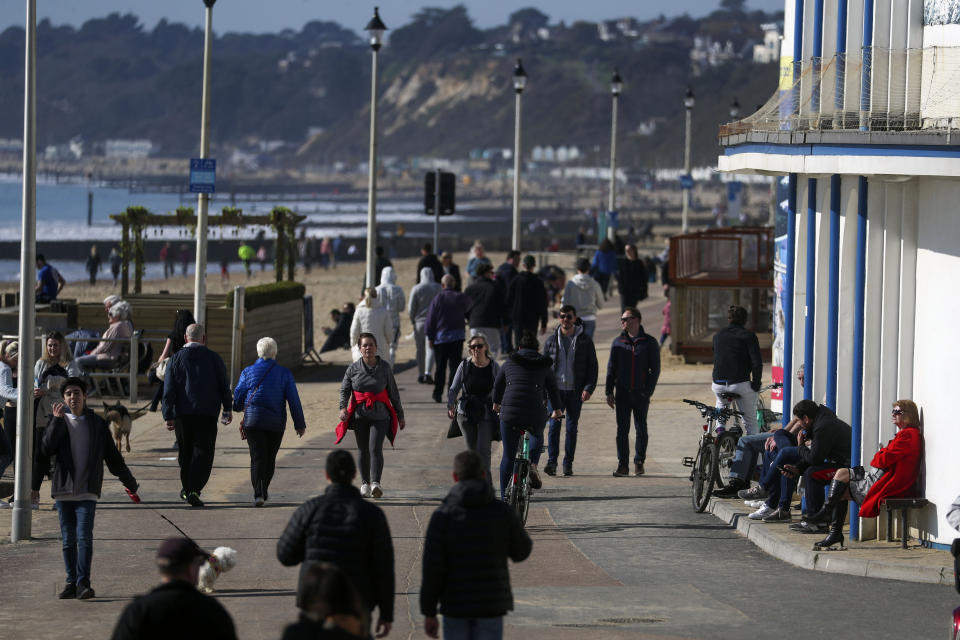 People enjoy the sunshine on Bournemouth beach, Dorset. Picture date: Saturday February 27, 2021.