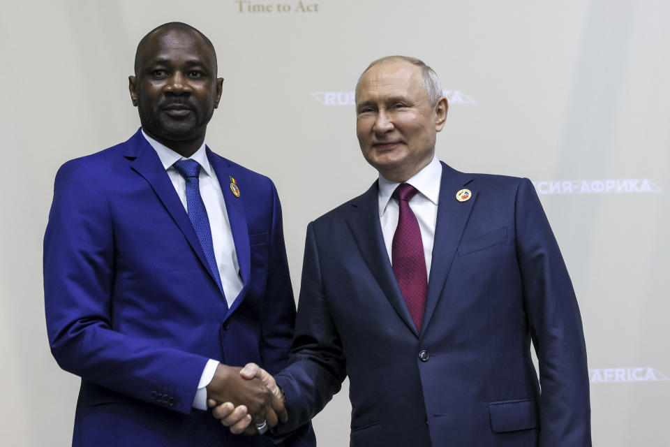 Russian President Vladimir Putin, right, and President of the Transition of the Republic of Mali, Assimi Goita, shake hands on the sideline of the Russia Africa Summit in St. Petersburg, Russia, Thursday, July 27, 2023. (Mikhail Metzel/TASS Host Photo Agency Pool Photo via AP)