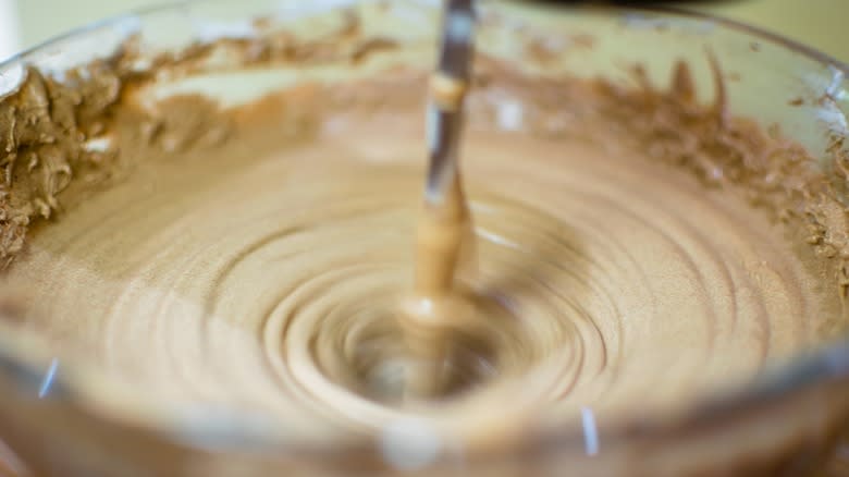 Hand mixer blending ice cream