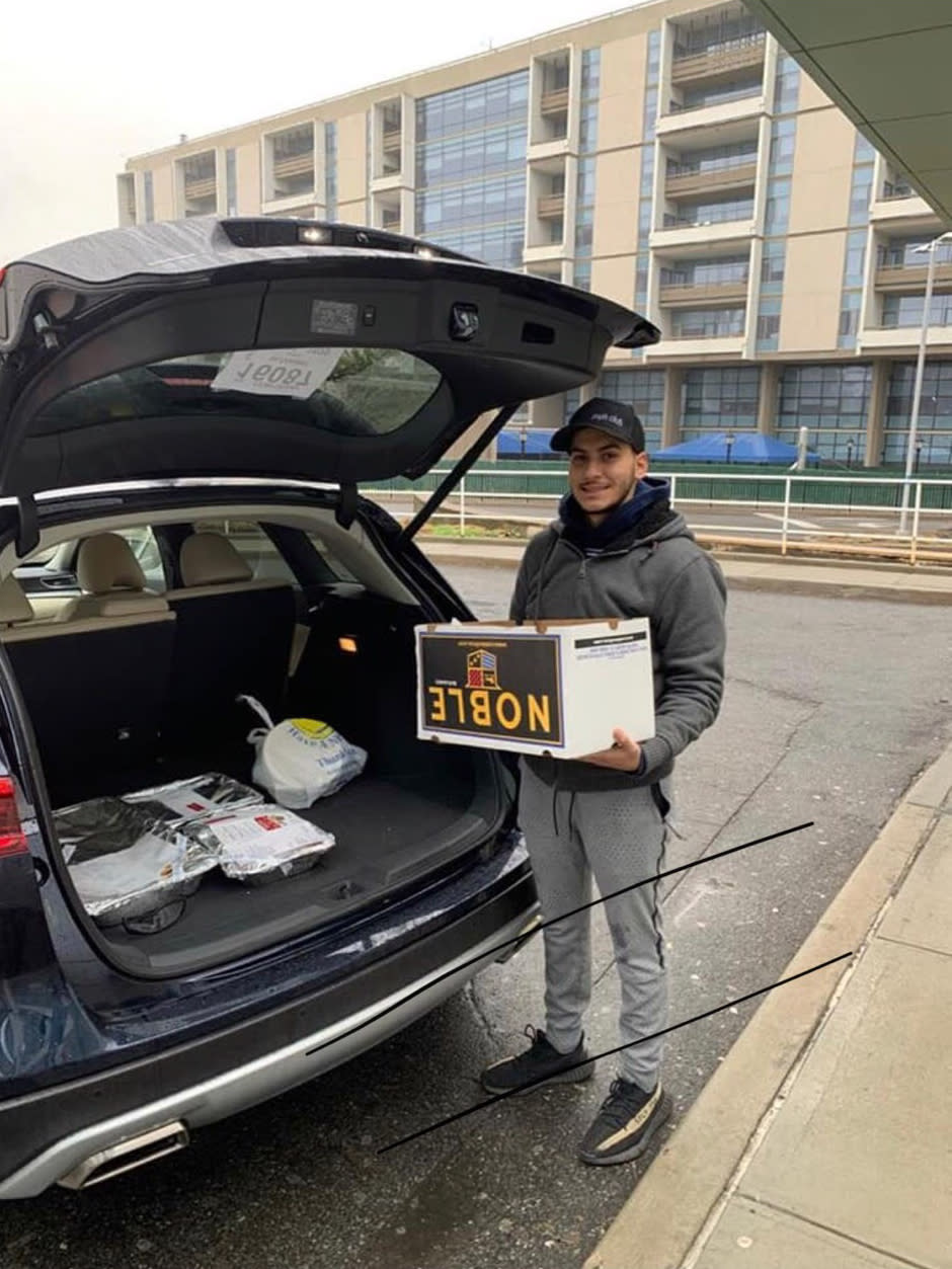 Eytan Israelov delivering kosher meals to hospital workers at Long Island Jewish Medical Center. (Photo courtesy of Eytan Israelov)