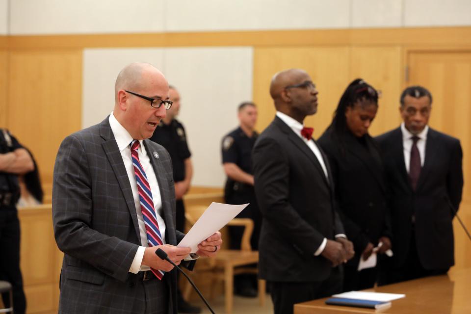 Assistant District Attorney Craig Ascher reads the victim's impact statement before Dr. Alika Crew's sentencing for first-degree assault in the 2020 stabbing attack on her ex-fiance's girlfriend, Sept. 15, 2023 at Westchester County Court in White Plains. Dr. Crew's lawyers are seeking leniency under state Domestic Violence Survivors Justice Act that allows mitigation if criminal conduct resulted from significant domestic abuse.