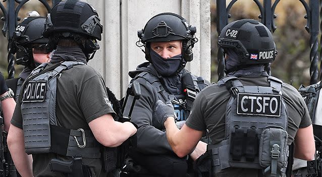 Officers patrolling the street. Photo: AAP