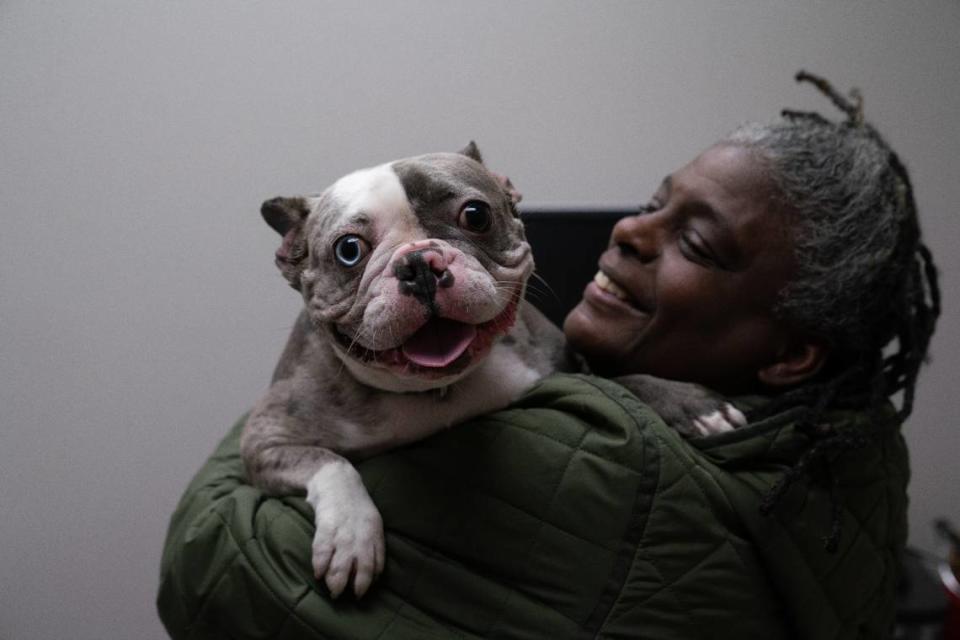 Elana January holds her dog, Heaven, at East St. Louis’s Gateway Pet Guardians on Jan. 11, 2024. In addition to spay and neuter programs, Gateway Pet Guardians is also home to a nonprofit vet clinic.