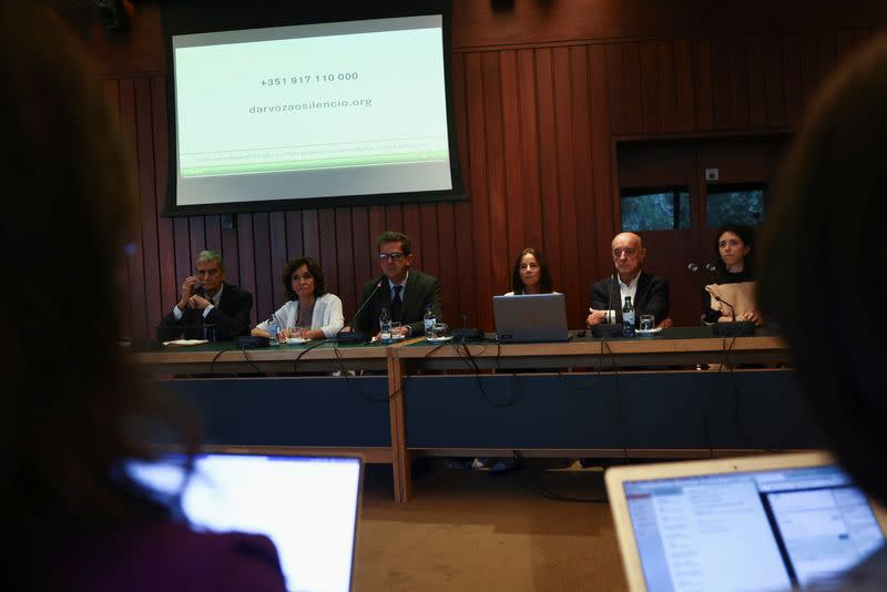 The commission investigating allegations of historical child sexual abuse by members of the Portuguese Catholic church attends a news conference in Lisbon