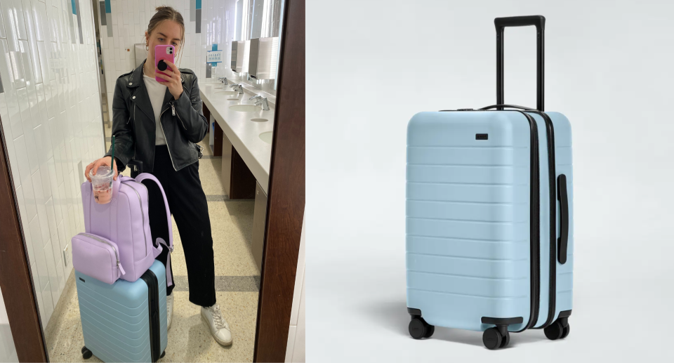 woman taking mirror selfie in black pants and black leather jacket with blue carry on suitcase and purple backpack, blue The Carry-On Flex suitcase from away travel 