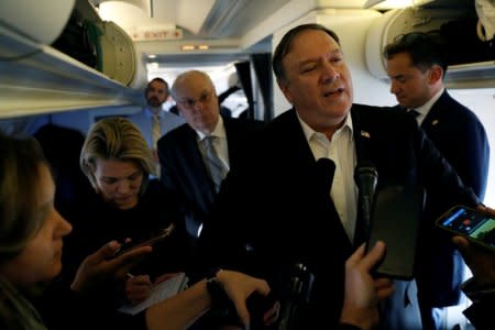 U.S. Secretary of State Mike Pompeo speaks to reporters while his plane refuels in Brussels, Belgium October 17, 2018. REUTERS/Leah Millis/Pool