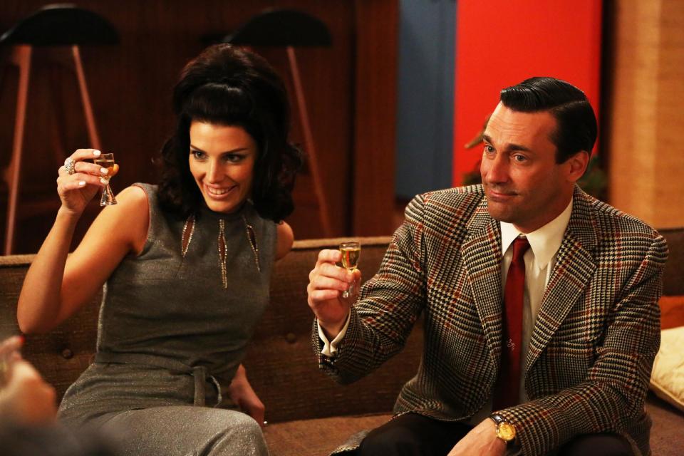 This publicity photo provided by AMC shows Jessica Pare as Megan Draper, left, and Jon Hamm as Don Draper in a scene of "Mad Men," Season 6, Episode 2. “Mad Men” returns for its sixth season Sunday, April 7, 2013. (AP Photo/AMC, Michael Yarish)