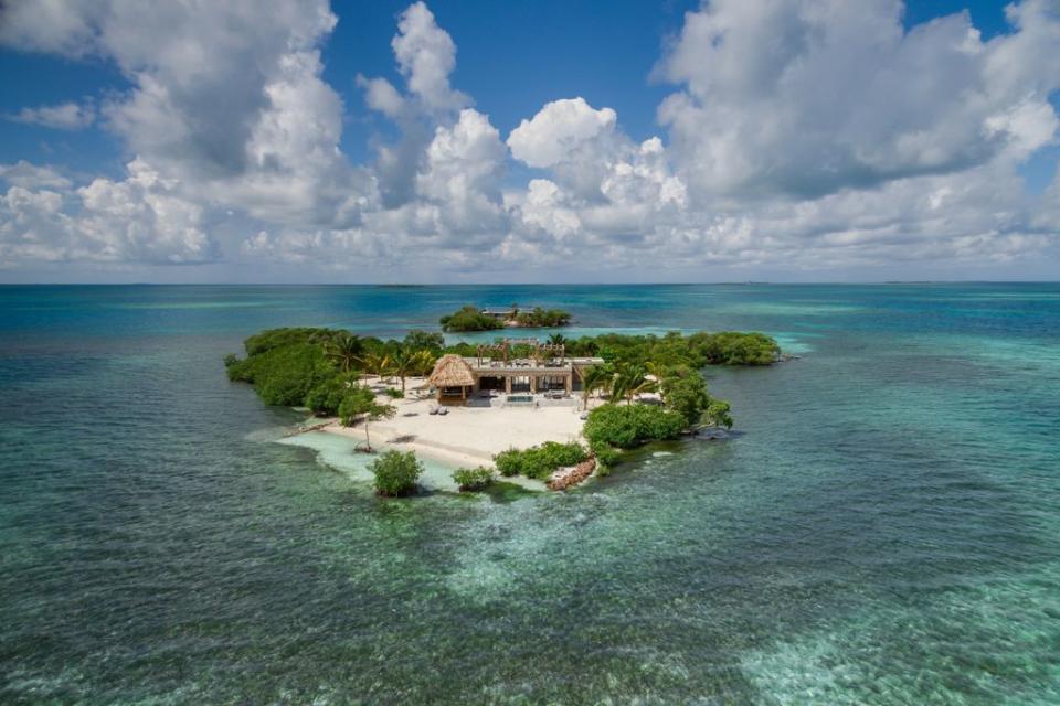 <h3><strong><a rel="nofollow noopener" href="https://www.vrbo.com/1122379" target="_blank" data-ylk="slk:Gladden Island, Belize;elm:context_link;itc:0;sec:content-canvas" class="link ">Gladden Island, Belize</a></strong></h3> <p>Talk about the ultimate romantic getaway: This ultra-secluded speck of land is built for two with all of the amenities of a luxury resort. Situated in the Belize Barrier Reef System, Gladden Island is surrounded by sweeping views of aqua seas and perched on the edge of one of the most picturesque parts of the reef. Spend your days exploring the wildest parts of the waters on dive and snorkeling trips. Back at home, your personal concierge can schedule spa treatments and local meals prepared by celebrated guest chefs. <i>Rates from $3,073 per night.</i></p>