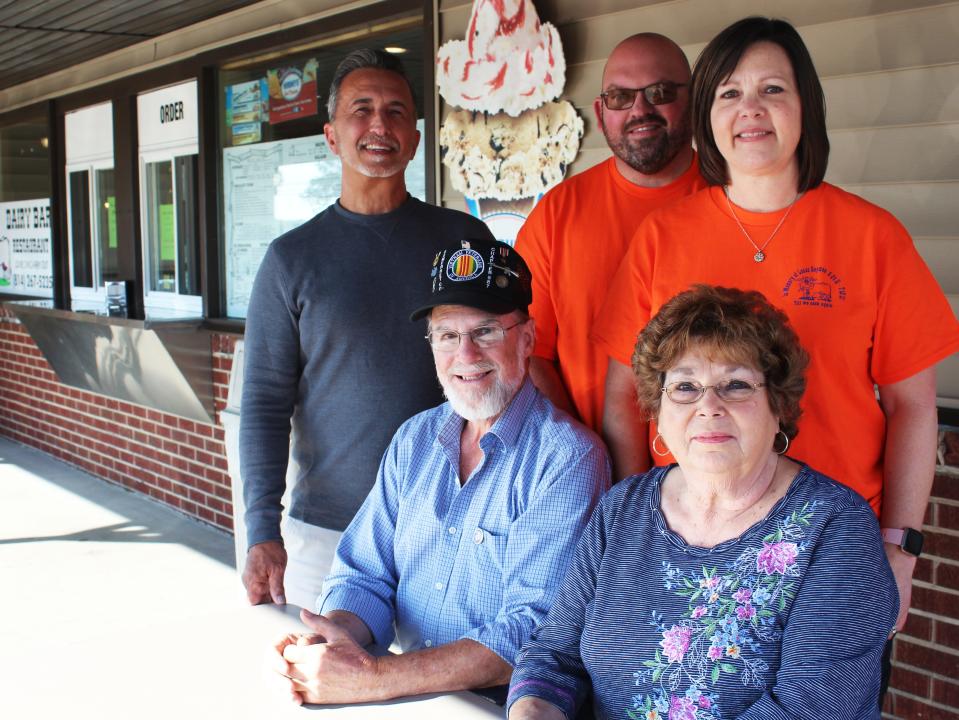 The Dairy Bar Restaurant in Berlin has remained in the same family for 45 years. Here, Bill and Barbara Glessner (seated), operated the restaurant in the previous generation since 1978 and later their daughter, Missi May, took over in the early 2000s. May and her husband, Mike Griffith, have decided to sell the establishment in recent months. Jeff Miele (standing left), owner of Coalfield Mini-Mart in Berlin, has purchased it and will reopen it as Coalfield's Diner on Nov. 1 with a new menu.