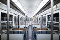 The subway is empty of passengers during curfew in Paris, Saturday, Oct. 17, 2020. French restaurants, cinemas and theaters are trying to figure out how to survive a new curfew aimed at stemming the flow of record new coronavirus infections. The monthlong curfew came into effect Friday at midnight, and France is deploying 12,000 extra police to enforce it. (AP Photo/Lewis Joly)