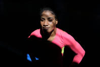 Guinean wrestler Fatoumata Yarie Camara poses for a portrait at the end of her morning training session at the Ostia's Olympic training center, near Rome, Monday, July 5, 2021. A West African wrestler's dream of competing in the Olympics has come down to a plane ticket. Fatoumata Yarie Camara is the only Guinean athlete to qualify for these Games. She was ready for Tokyo, but confusion over travel reigned for weeks. The 25-year-old and her family can't afford it. Guinean officials promised a ticket, but at the last minute announced a withdrawal from the Olympics over COVID-19 concerns. (AP Photo/Alessandra Tarantino)