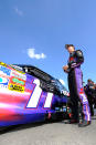 KANSAS CITY, KS - OCTOBER 09: Denny Hamlin, driver of the #11 FedEx Freight Toyota, stands on the grid prior to the start of the NASCAR Sprint Cup Series Hollywood Casino 400 at Kansas Speedway on October 9, 2011 in Kansas City, Kansas. (Photo by Jason Smith/Getty Images for NASCAR)